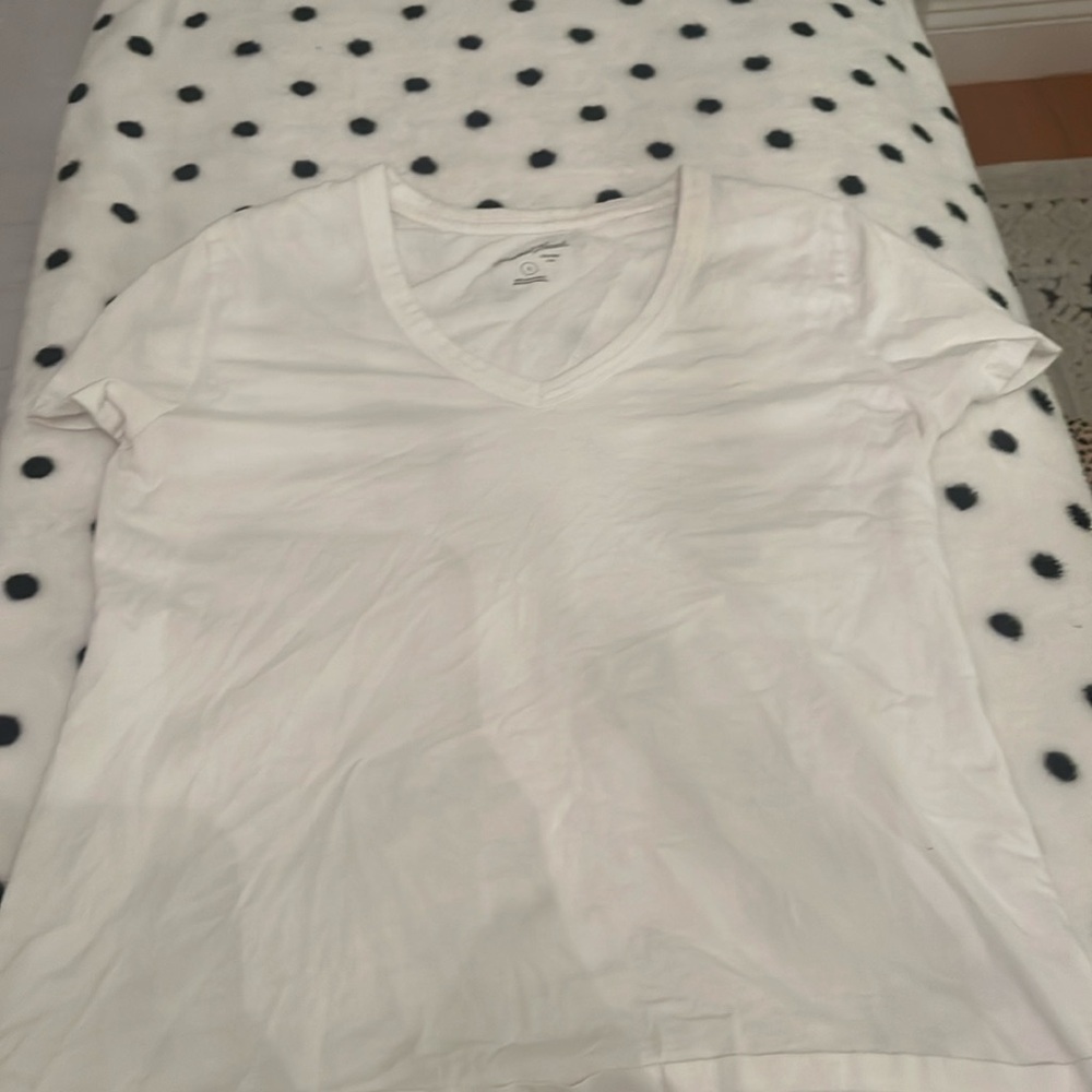 Basically brand new Universal thread size small woman’s white shirt